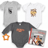 Three baby onesies with different designs and a book titled 'Rock Legends' on a white background.