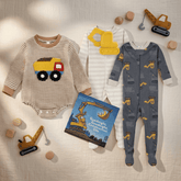 Children's clothing and toys on a textured surface