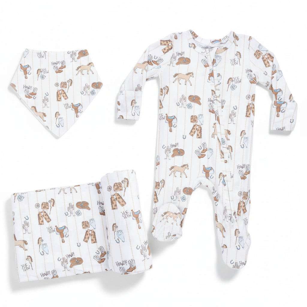 Baby onesie, hat, and blanket with animal pattern on a white background