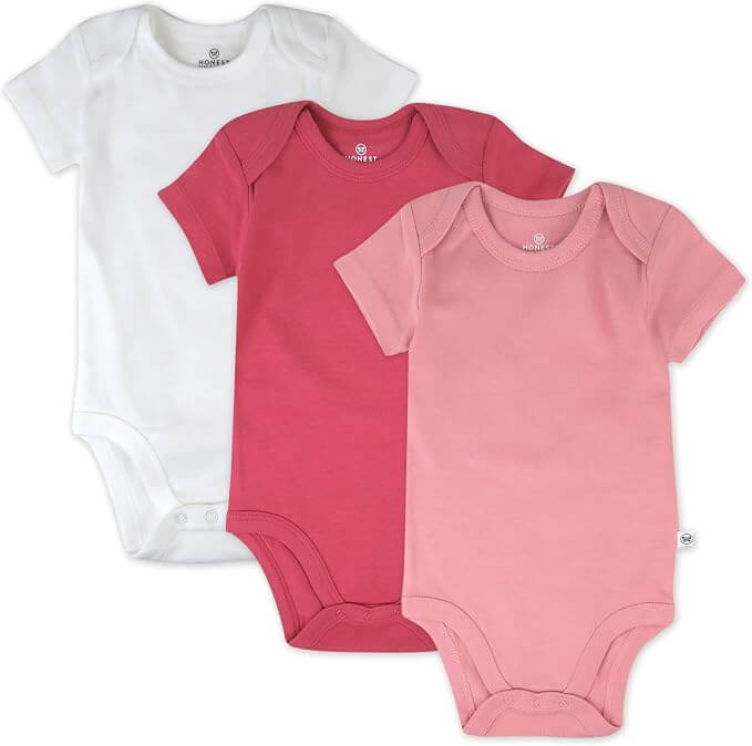 Three short-sleeve baby bodysuits in white, dark pink, and light pink, arranged in a fan shape on a white background.