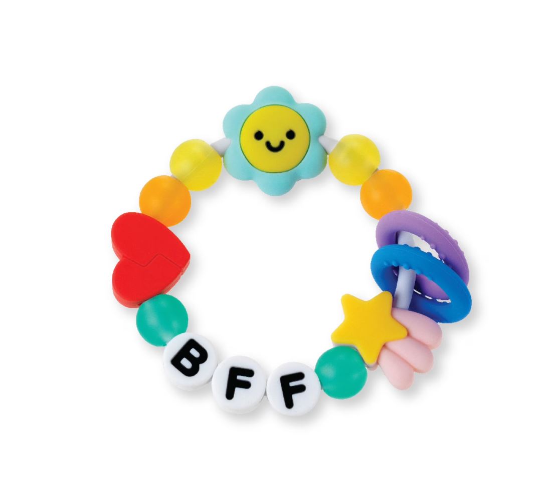 Colorful baby teething ring with 'BFF' letters on a white background