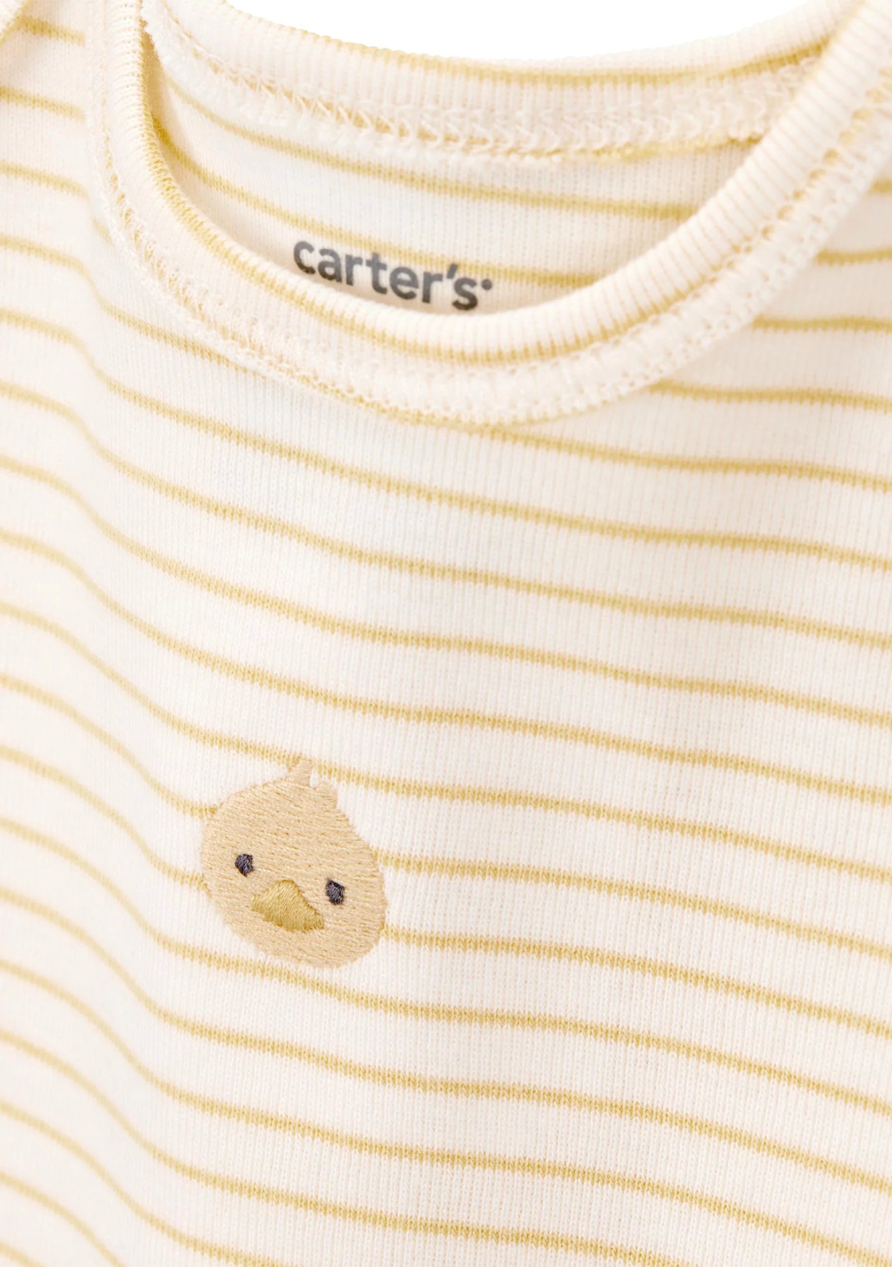 Close-up of a Carter's baby t-shirt featuring thin yellow horizontal stripes on a cream base, with a small embroidered yellow duck face on the chest.