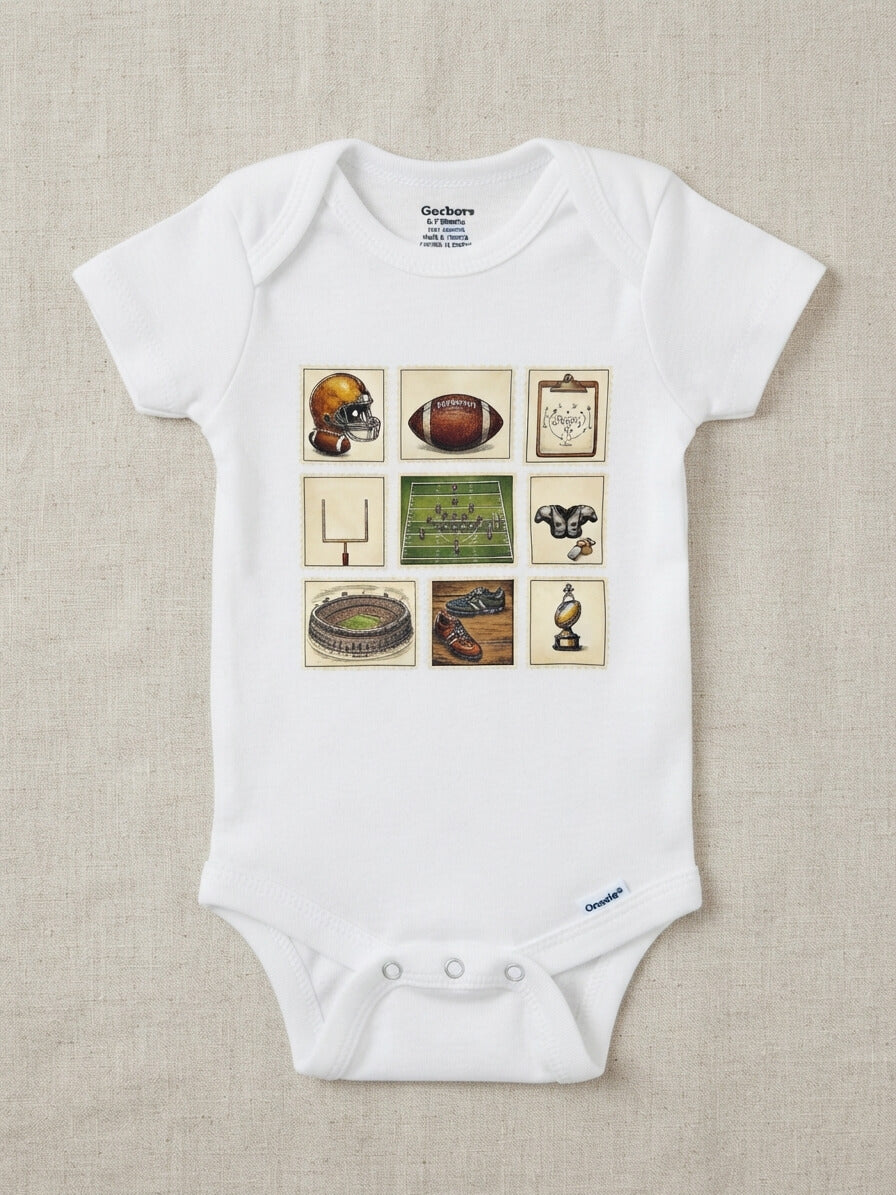 A white short-sleeve baby bodysuit with a central graphic print of nine football-themed illustrations, laid flat on a textured beige linen background. The bodysuit features a Gildan brand label at the inner neck and a small blue Gildan logo near the bottom right hem.