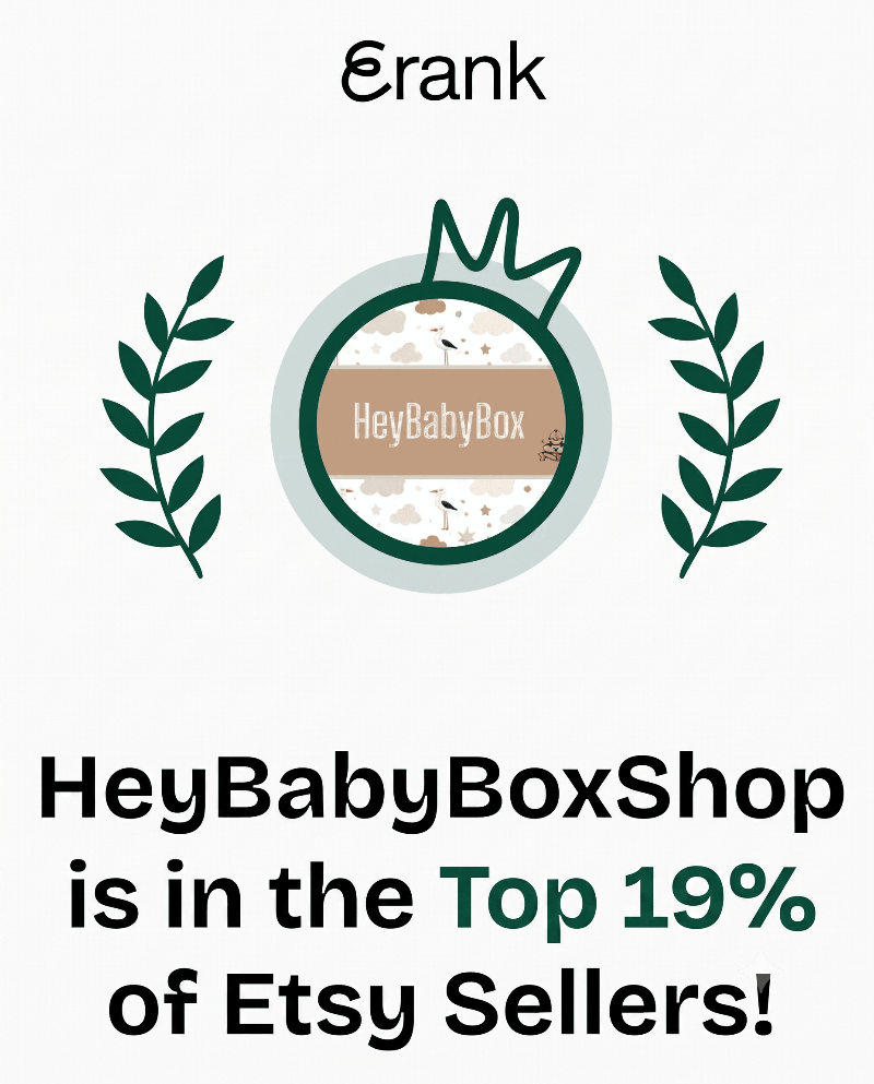 HeyBabyBoxShop logo with laurel wreath on a white background, indicating top seller status on Etsy.