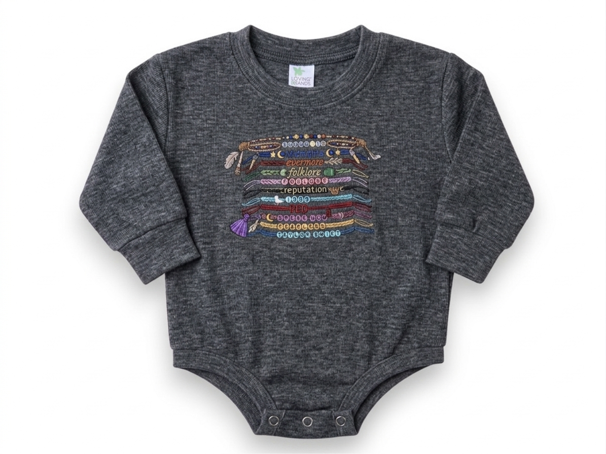Gray baby onesie with colorful graphic design on a white background
