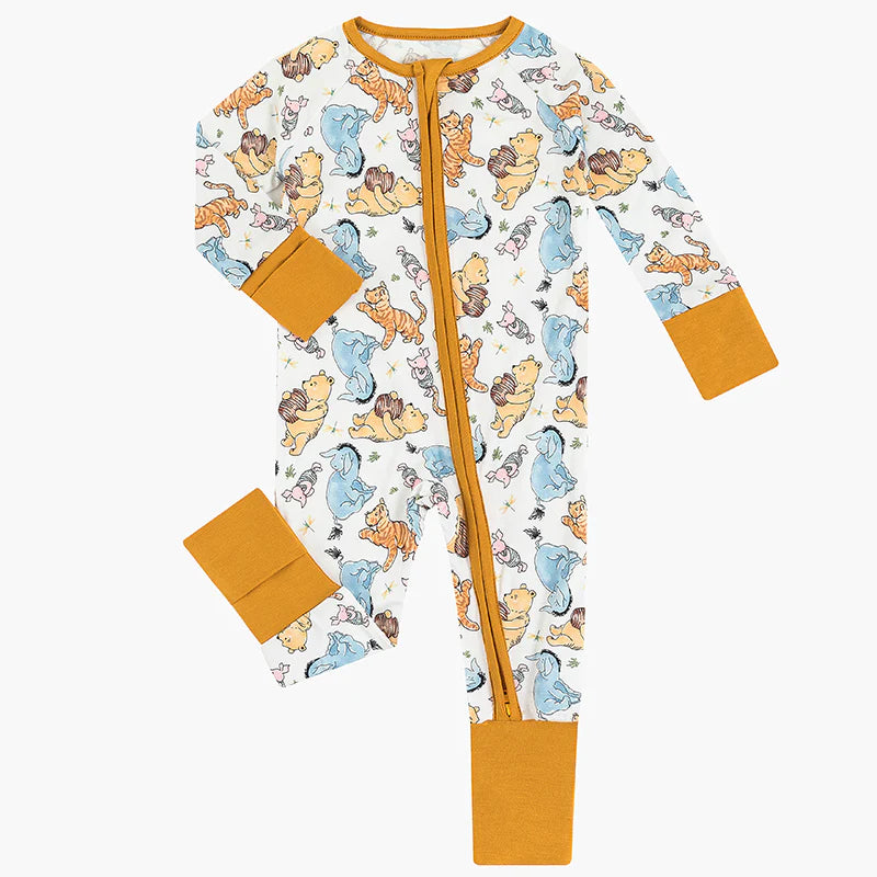 Baby onesie with cartoon character pattern on a white background