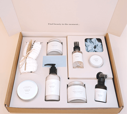 Set of skincare products in a box with text 'Find beauty in the moment'.