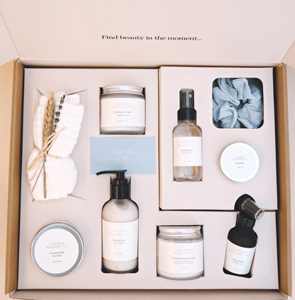 Gifting set with skincare products and decorative items in a box.