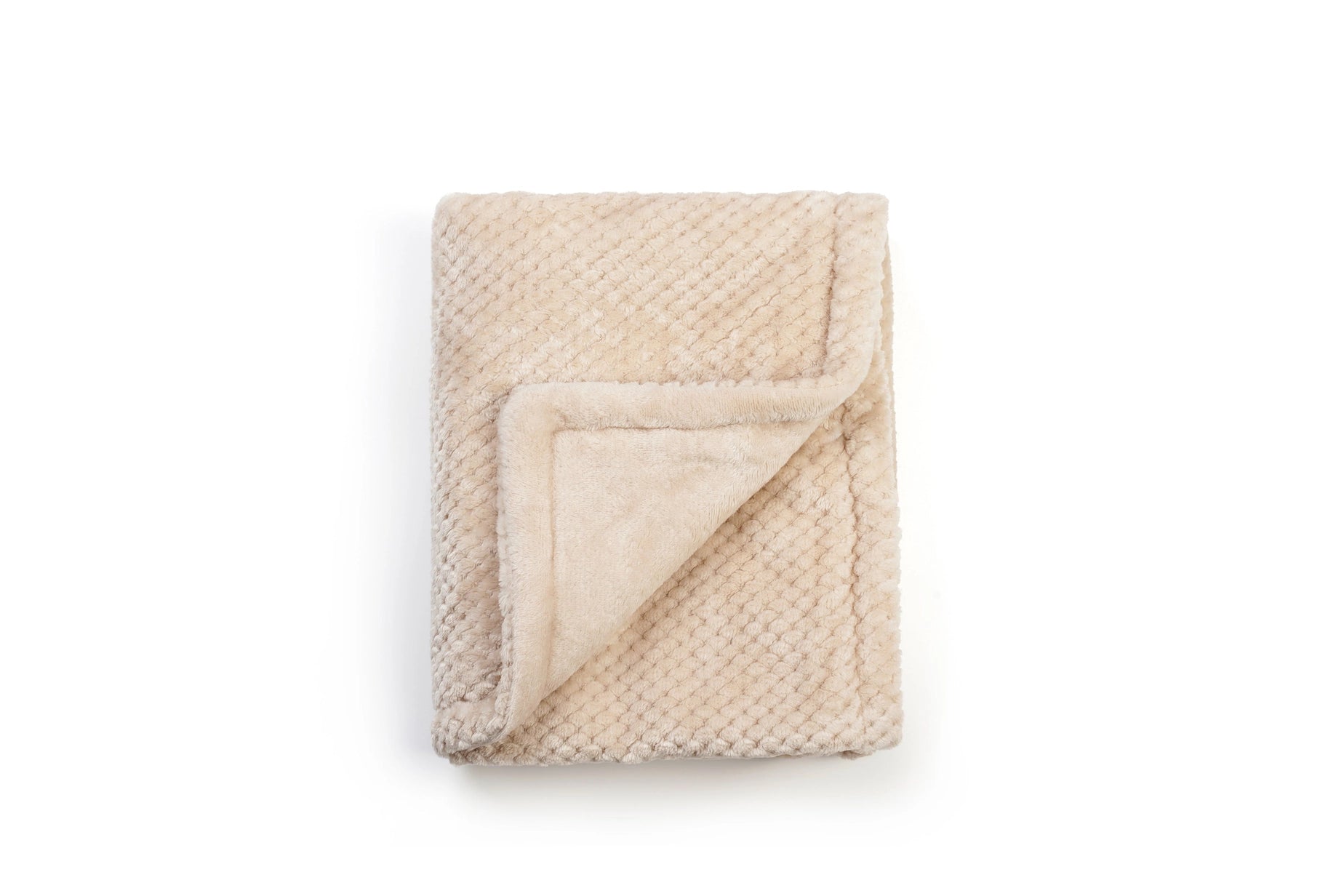 Beige blanket with textured surface on a white background