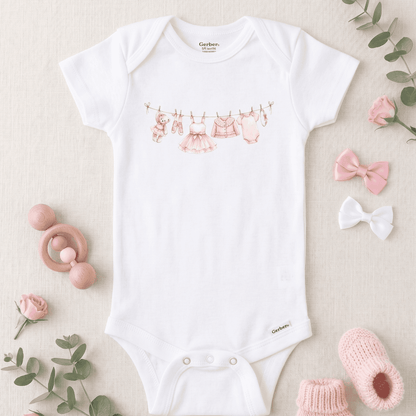 Angel Dear Bamboo Ballerina Romper 0-3M Angel Dear Tutu Twirl Bubble 0-6M Pink Stripe Ribbed Onesie 0-3M Tiny Ballerina Clothes Line Onesie 0-3M Pink Bow Pink Teether Book: "I'm a Ballerina" Little Golden Book