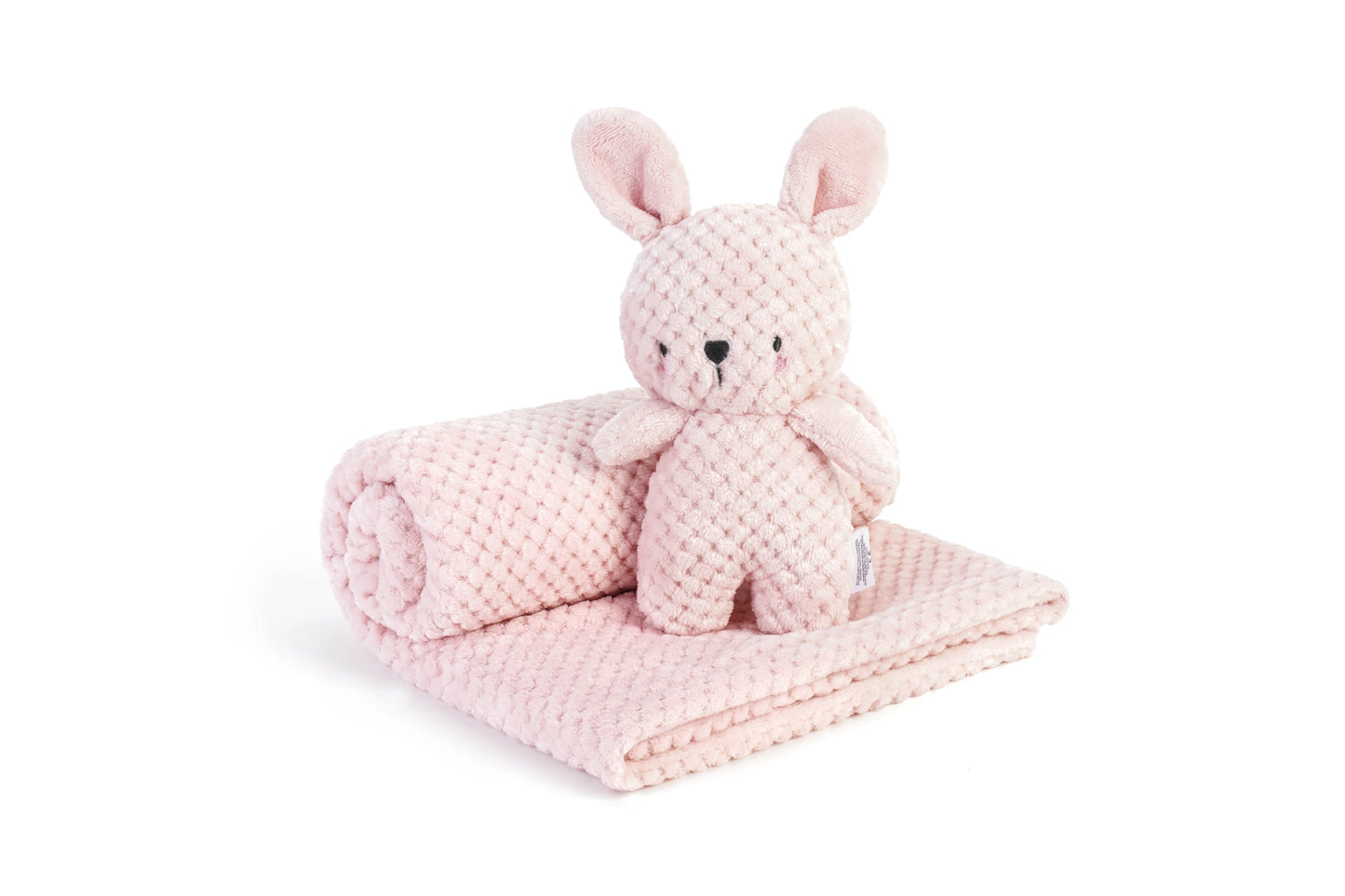 Pink plush toy and blanket set on a white background