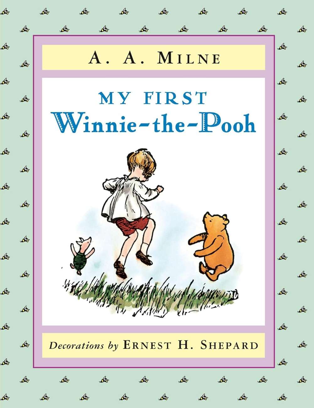 Book cover of 'My First Winnie-the-Pooh' with illustrations of a child and Pooh bear on a light green background.