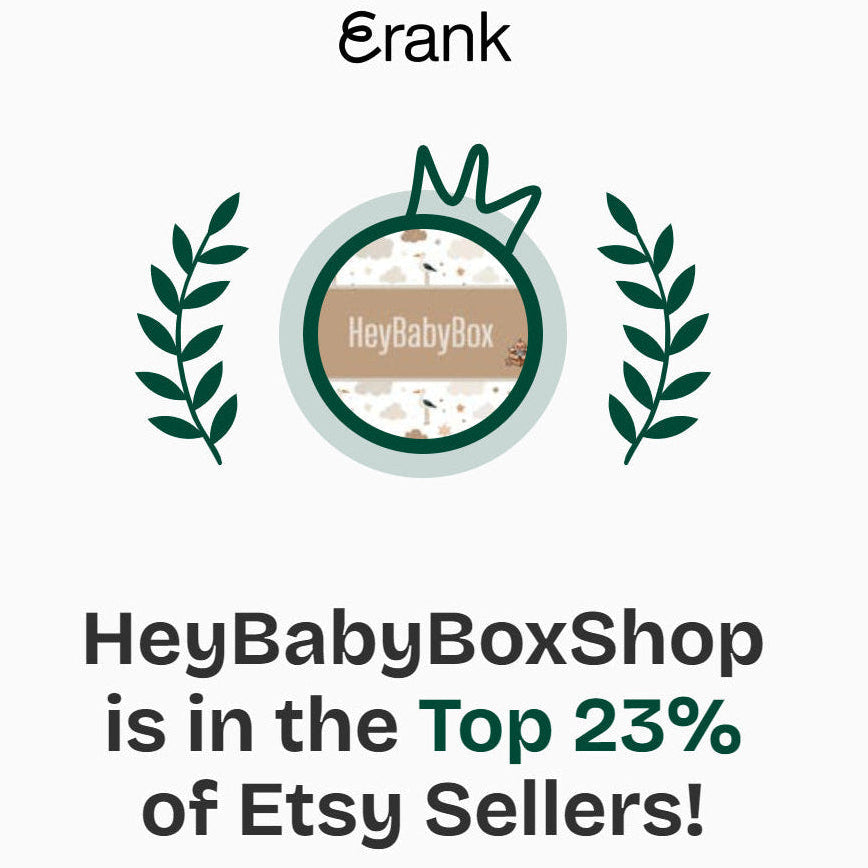 Notification card from Etsy showing 'HeyBabyBoxShop' in the Top 23% of Etsy Sellers with branding elements.