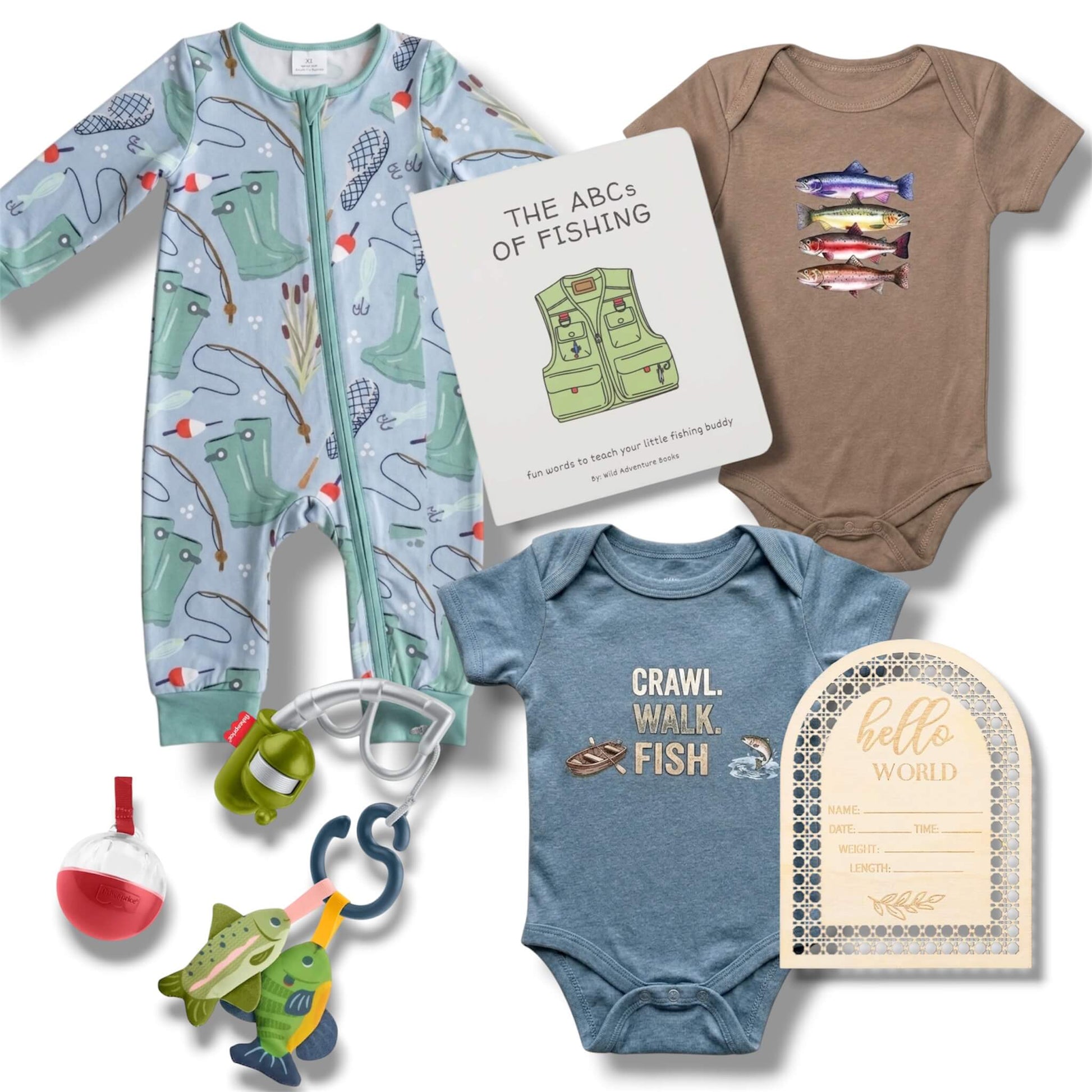 Collection of baby clothing and items with fishing theme on a white background