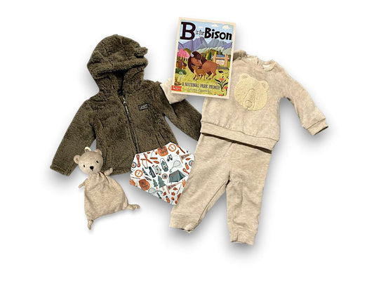 Mountain Baby Gift Set featuring bear plush, cozy outfit, and book, perfect for nature-loving families.