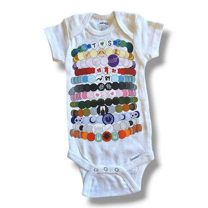 White baby onesie with colorful graphic design on a white background