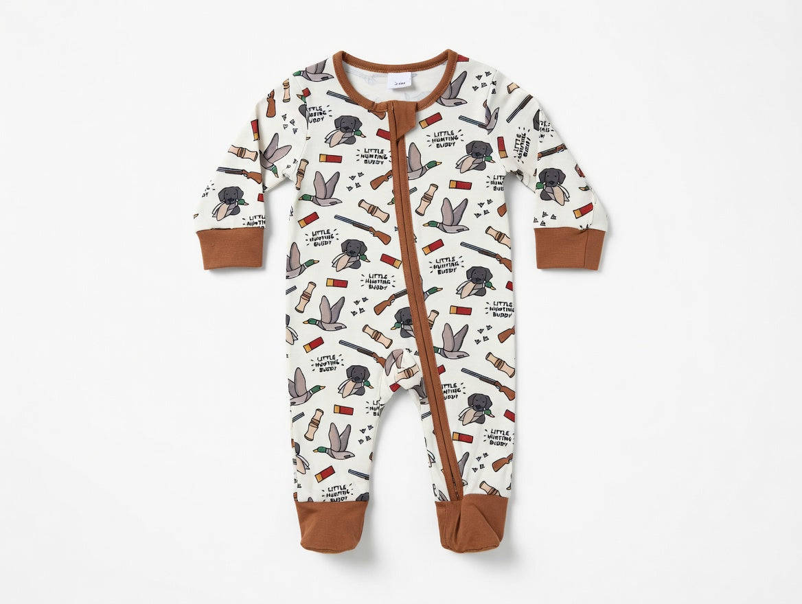 Baby onesie with a hunting pattern on a white background