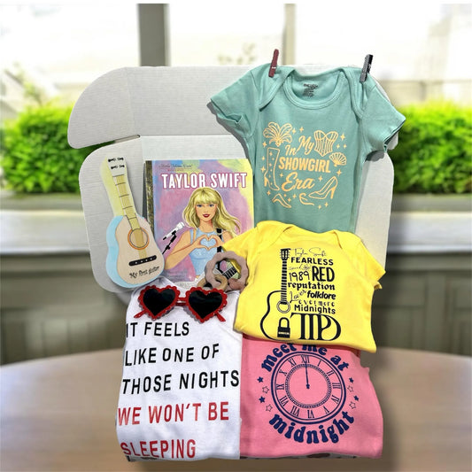Taylor Inspired Baby Gift featuring music-themed clothing, book, and accessories in a pop culture baby box.
