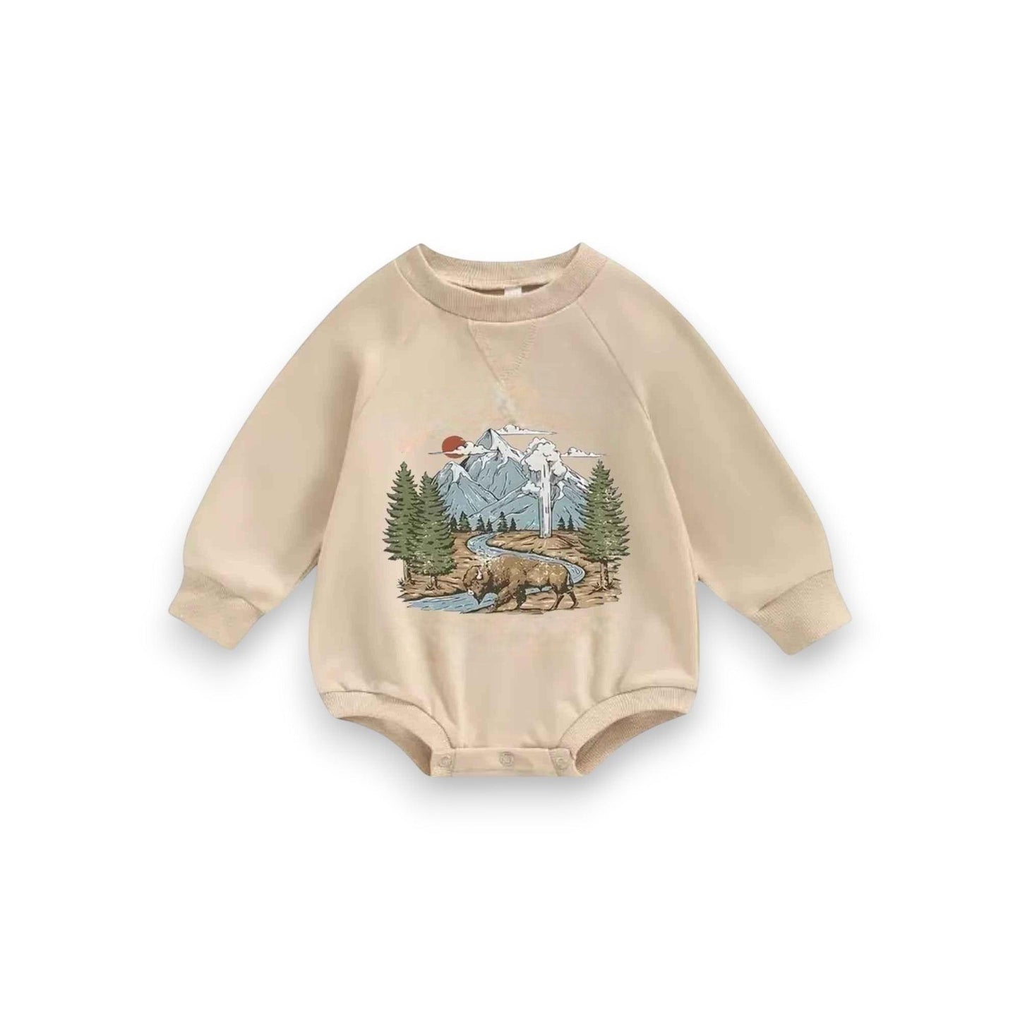 Hey Baby Box beige long-sleeve baby romper with a graphic print of a bison, pine trees, mountains, and a river.
