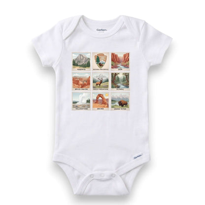 White baby onesie with national park illustrations on a white background