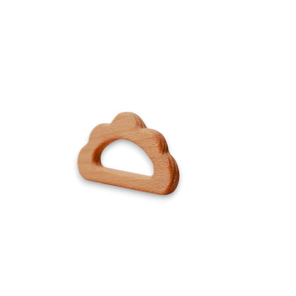 Wooden cloud-shaped teether on a white background
