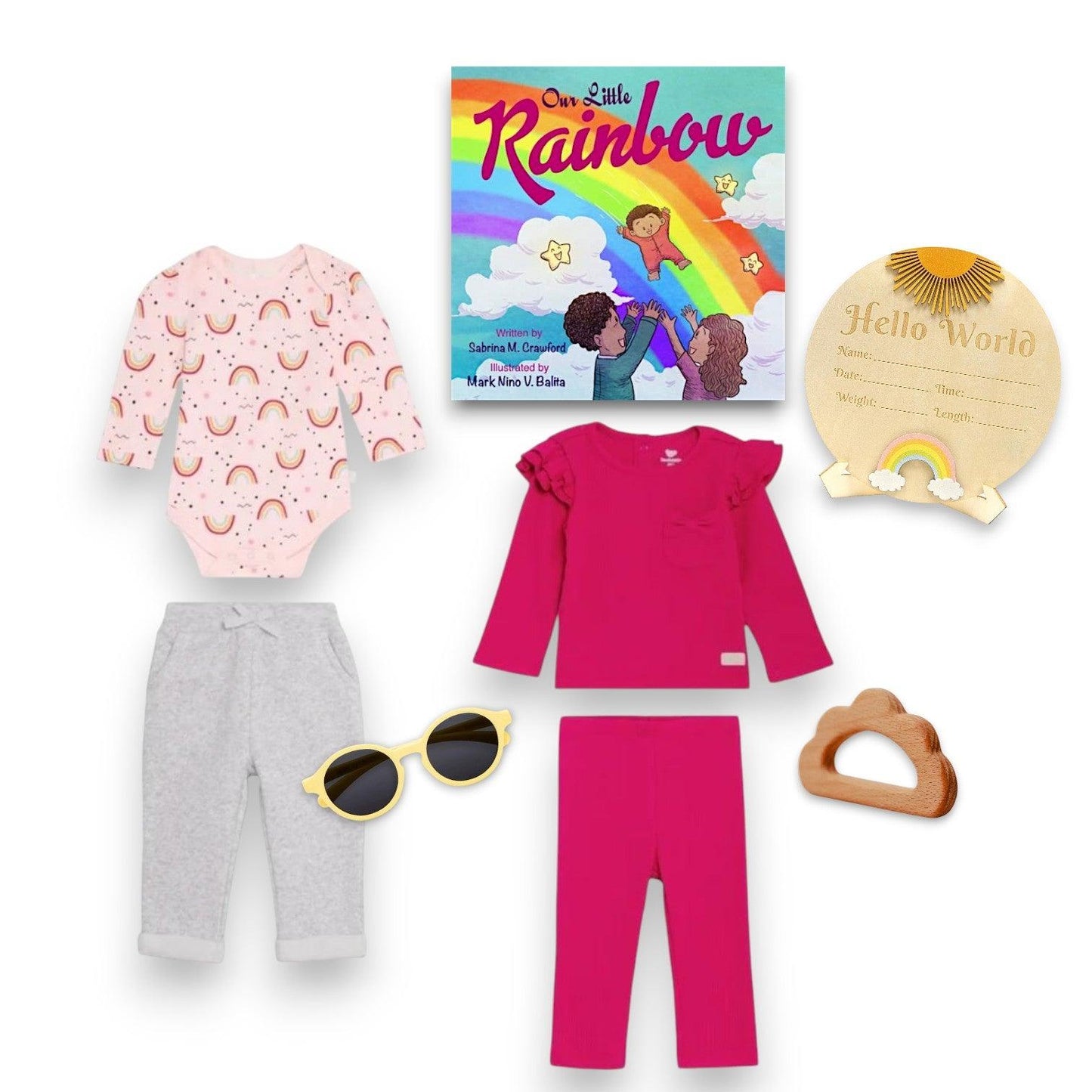Children's clothing set with a book titled 'Dear Little Rainbow' on a white background