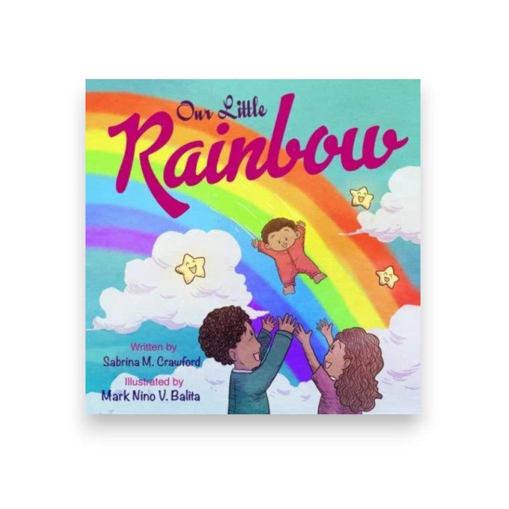 Book cover of 'Our Little Rainbow' with a colorful rainbow and children illustration.