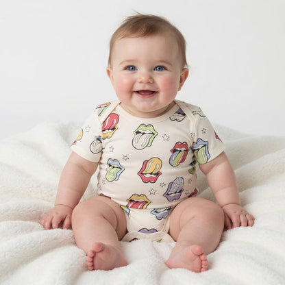 Hey Baby Box cream cotton short-sleeve onesie with a repeating pattern of colorful Rolling Stones lips and stars.