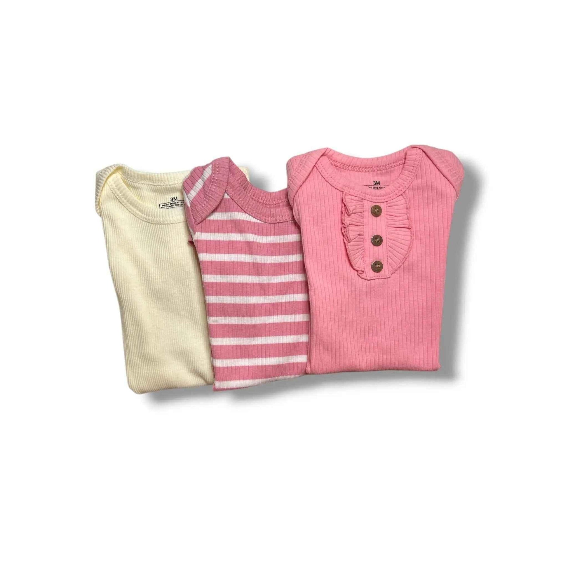 Soft baby onesies in pink, striped, and cream — perfect for newborns and baby showers