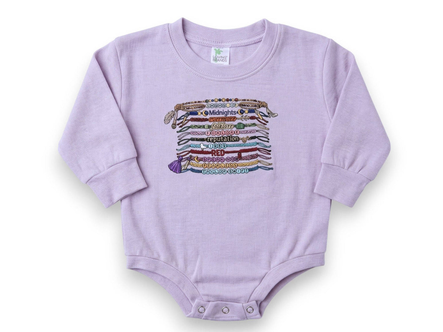 Purple baby onesie with colorful text design on a white background