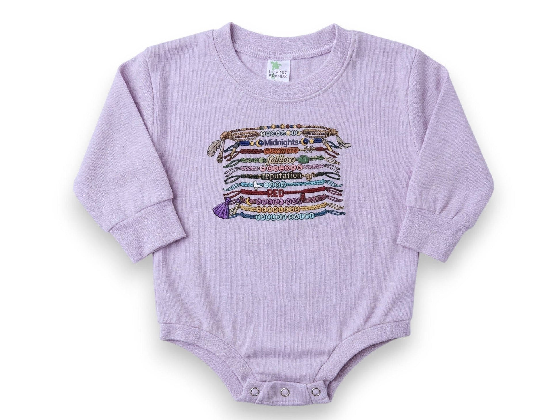 Purple baby onesie with colorful text design on a white background
