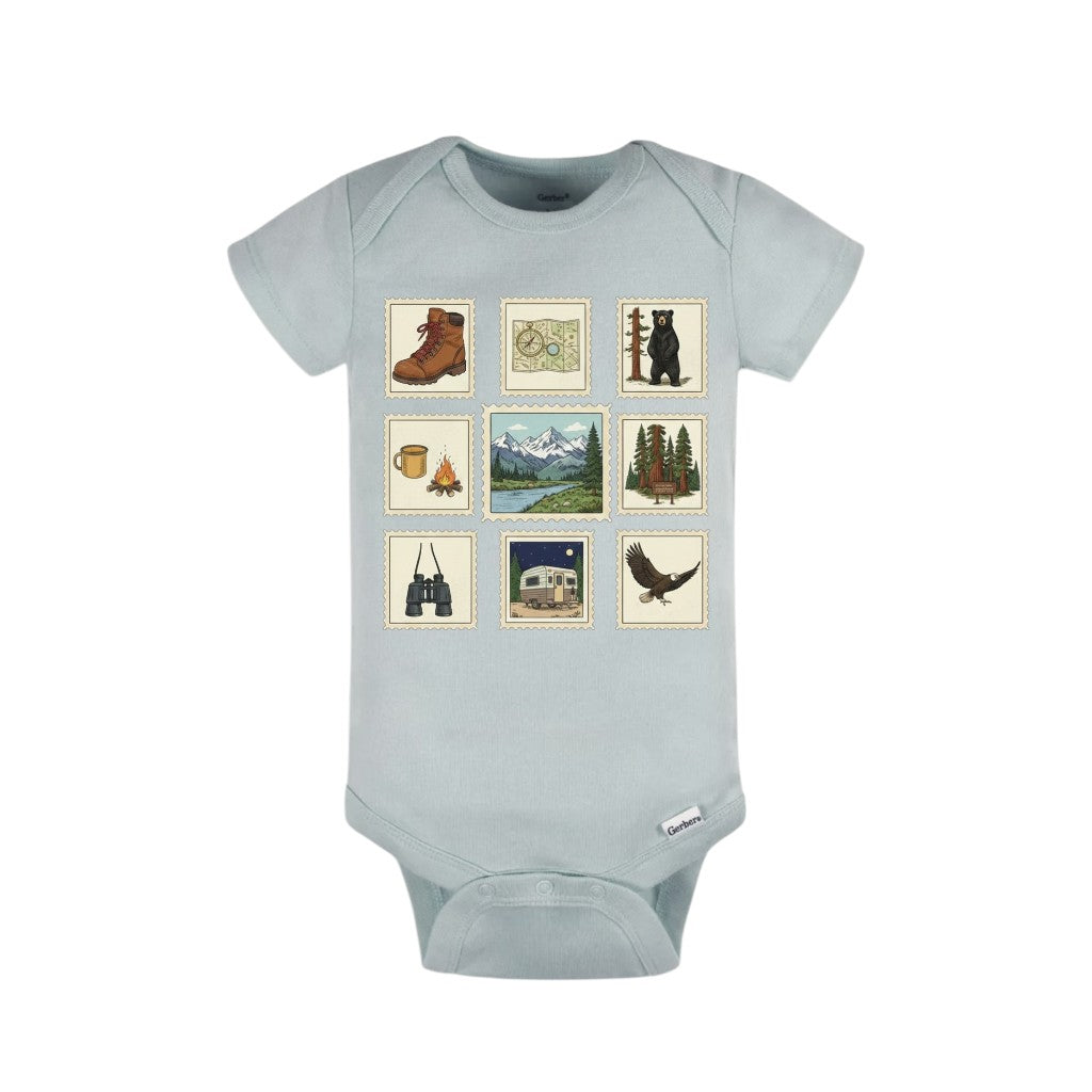 Light blue baby onesie with nature-themed graphics on a white background
