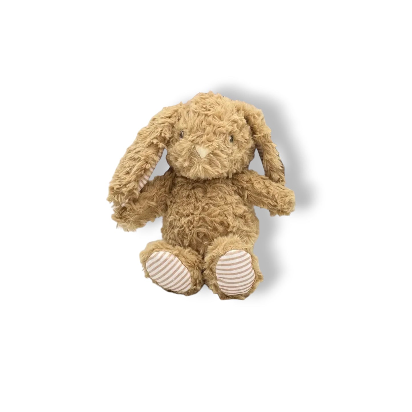 Brown plush bunny toy on a white background