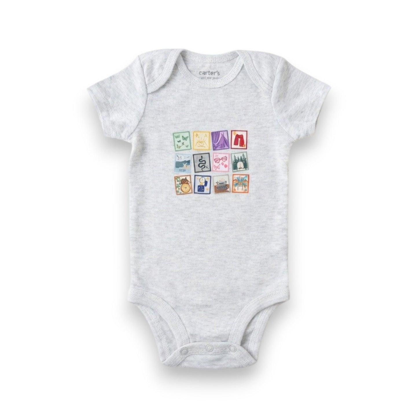 Gray baby onesie with colorful graphic on a white background