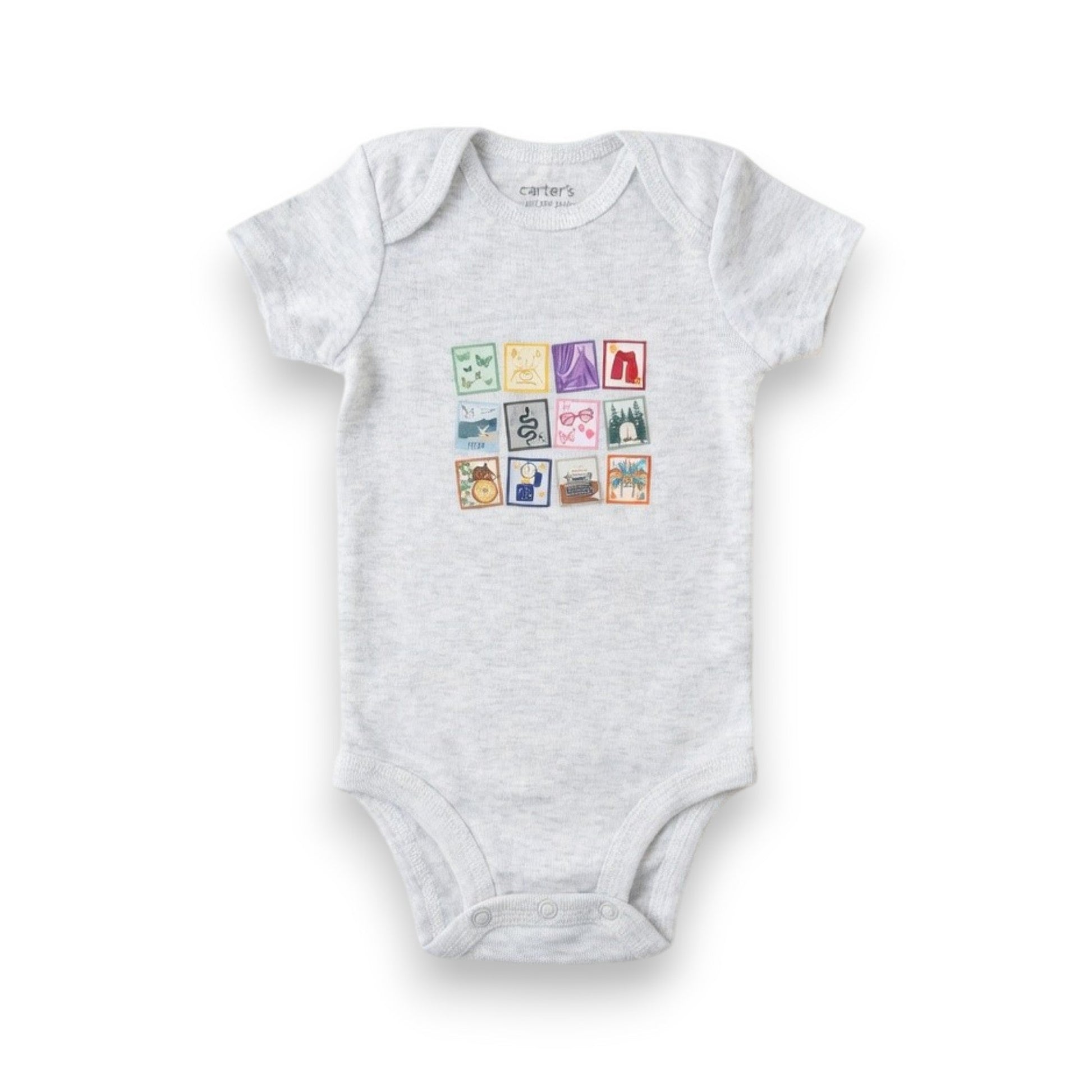 Gray baby onesie with colorful graphic on a white background
