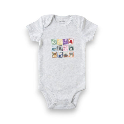 Gray baby onesie with colorful graphic on a white background