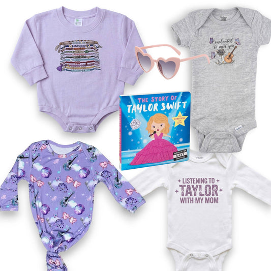 Collection of baby onesies and a book titled 'The Story of Taylor Swift' on a white background.