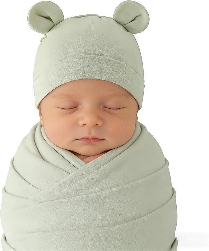 Quilted Forest Animals Onesie&nbsp;
Quilted Forest Tree Onesie
Quilted Grey Plaid Onesie
Sage Green Swaddle Blanket
Sage Green Coordinated Bear Hat
Soft Crinkle Fox Stroller Toy
Book: "My First Book of Forest Animals"