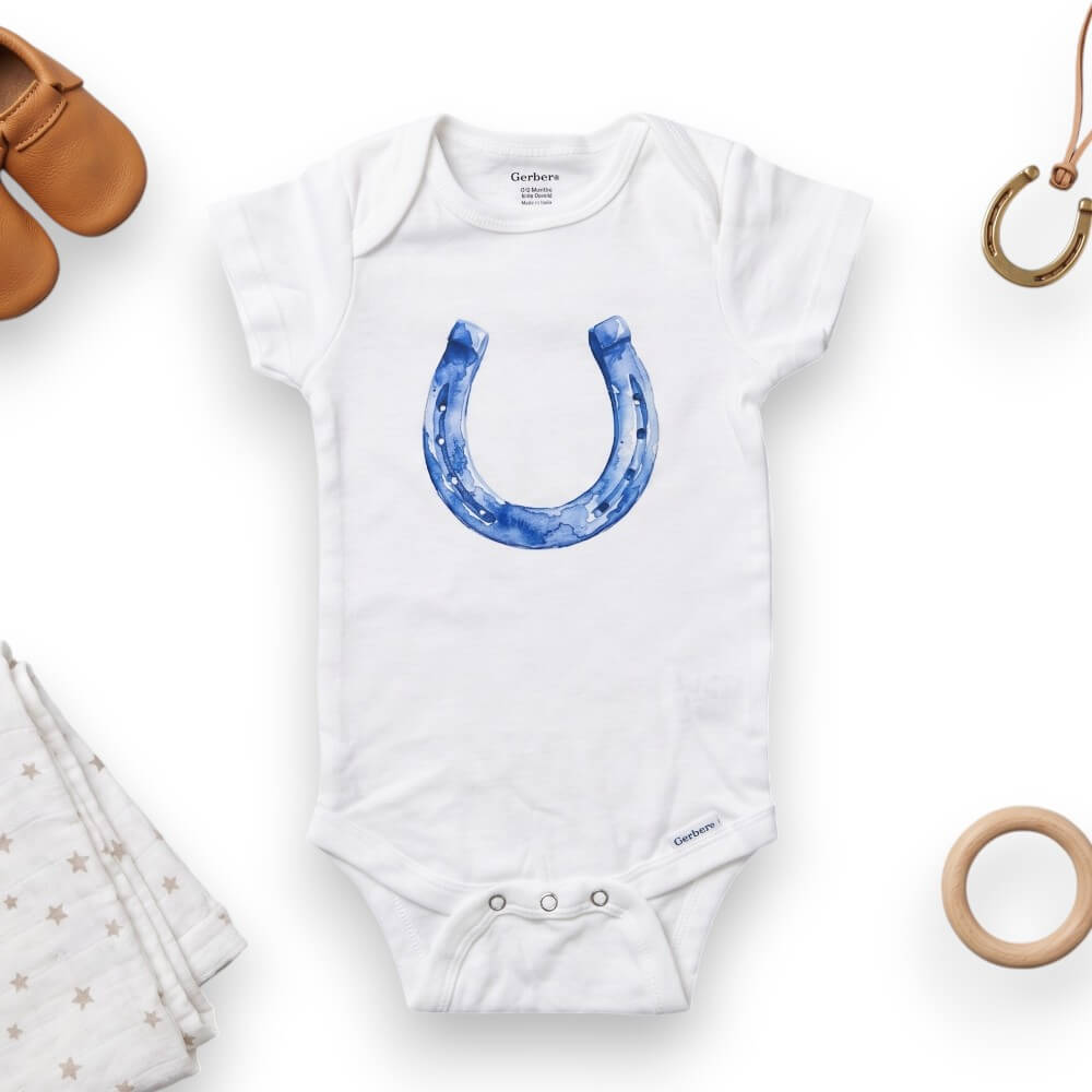 White baby onesie with blue horseshoe design on a white background