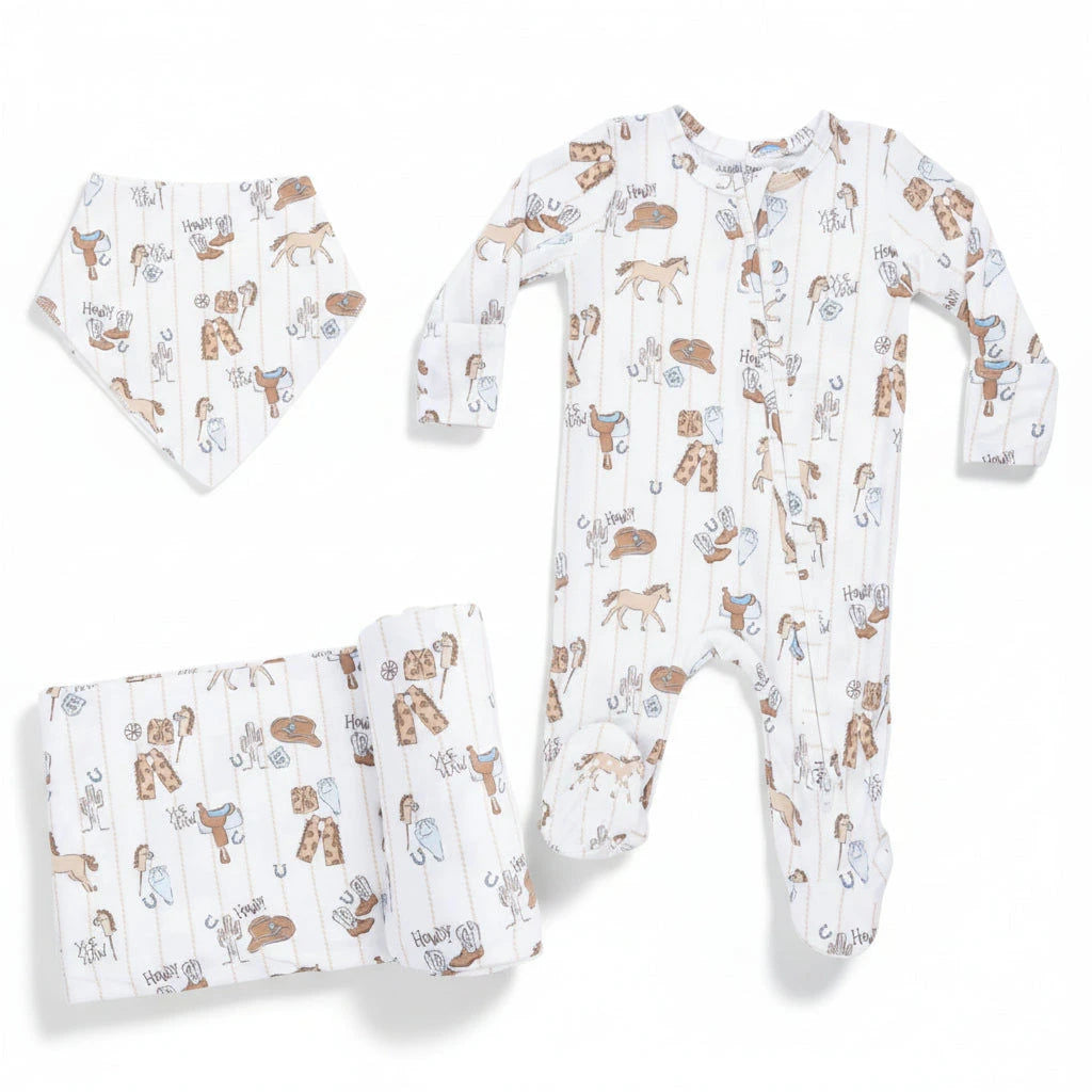 Baby onesie, hat, and blanket with animal pattern on a white background